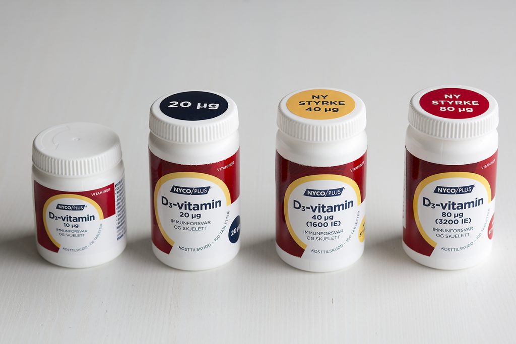 Fire D-vitaminprodukter med ulik styrke, bilde tatt ovenfra